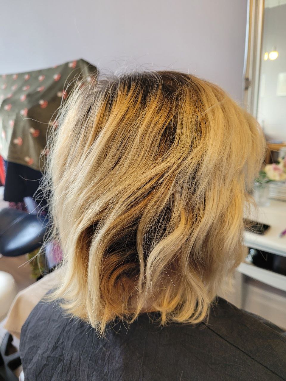 short blonde hair with dark roots
